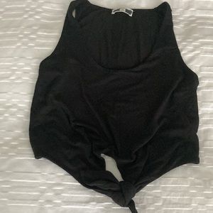 Flattering black tank top with front tie (Babaton)